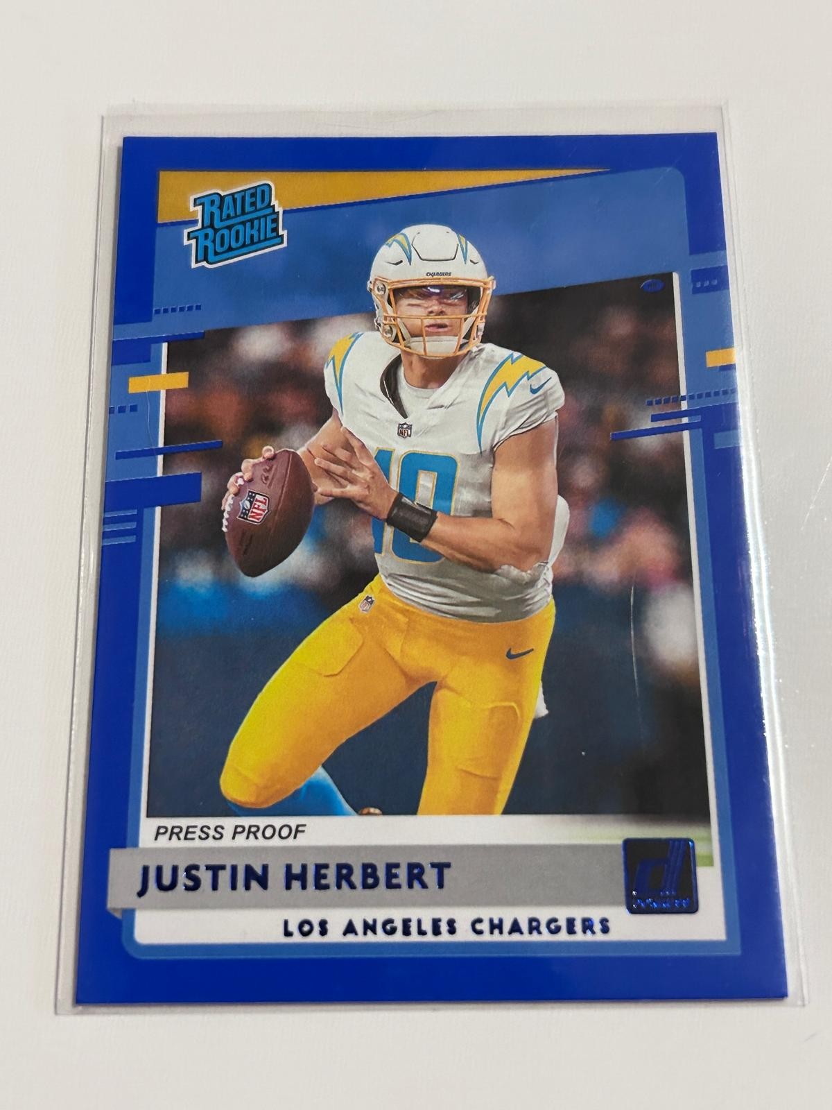 2020 Donruss #303 Justin Herbert Press Proof Blue RC Chargers 2020 Donruss #303 Justin Herbert Press Proof Blue RC Chargers