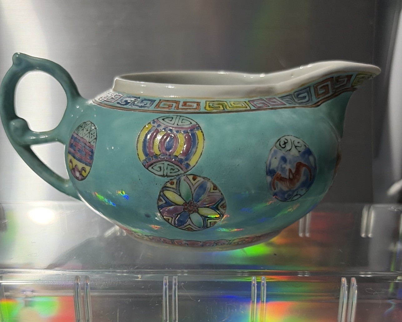 A Chinese Famille Rose Porcelain Tea Pitcher, Republic Period A Chinese Famille Rose Porcelain Tea Pitcher, Republic Period