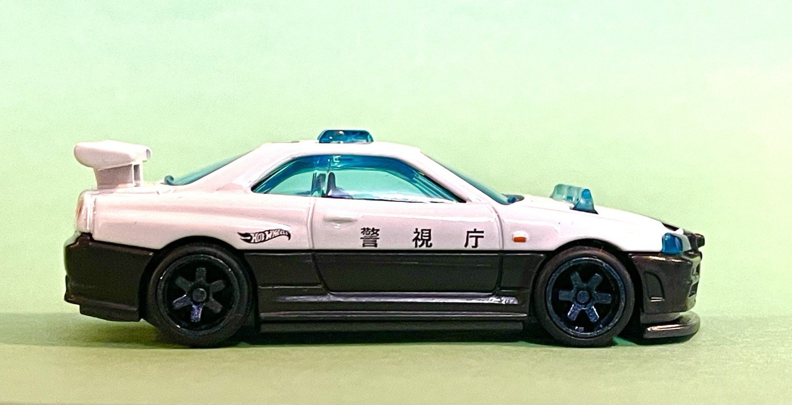 2027 New Hotwheels Nissan Skyline GTR R34 Japan Police Car Un Spun W/RRs