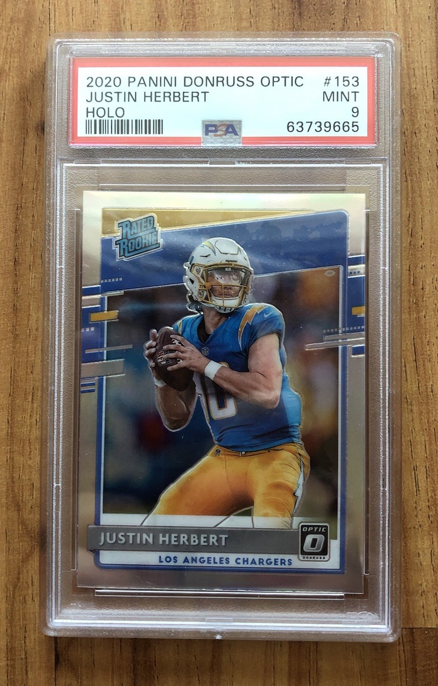 2020 Panini Donruss Optic - Rated Rookies Justin Herbert #153 Holo Prizm PSA 9 2020 Panini Donruss Optic - Rated Rookies Justin Herbert #153 Holo Prizm PSA 9