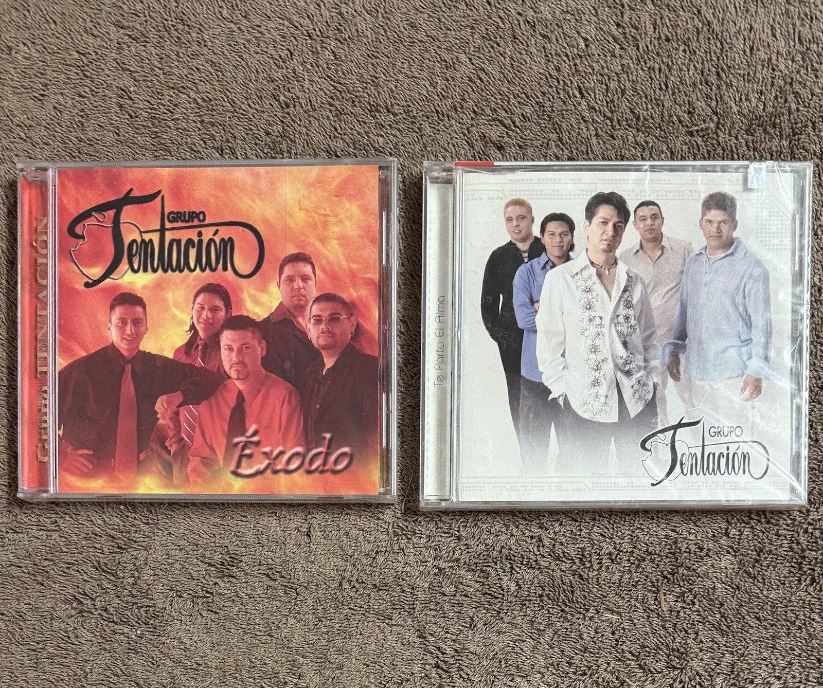 LOT OF 2 SEALED GRUPO TENTACION CDs - TE PARTO EL ALMA / EXODO - SONY DISCOS LOT OF 2 SEALED GRUPO TENTACION CDs - TE PARTO EL ALMA / EXODO - SONY DISCOS