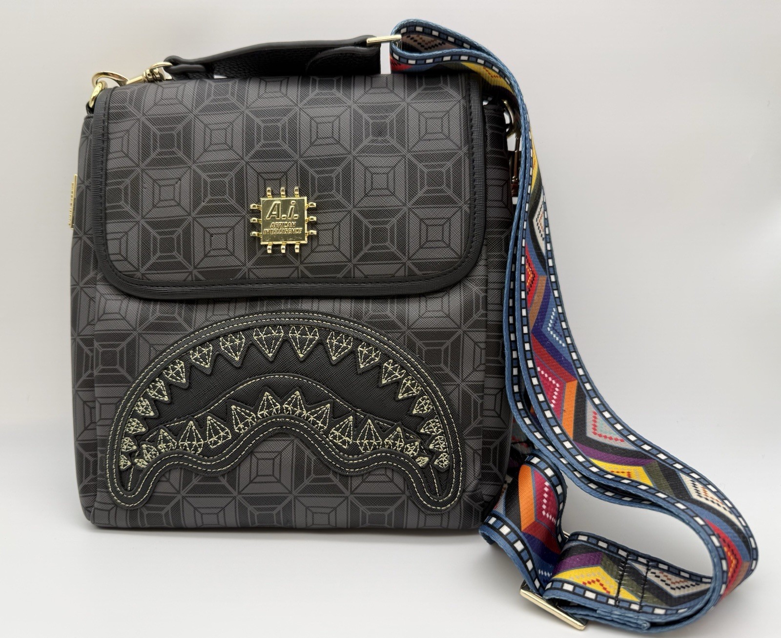 Sprayground A.I. African Intelligence Sandflower Black Shark Crossbody Bag Gold Sprayground A.I. African Intelligence Sandflower Black Shark Crossbody Bag Gold