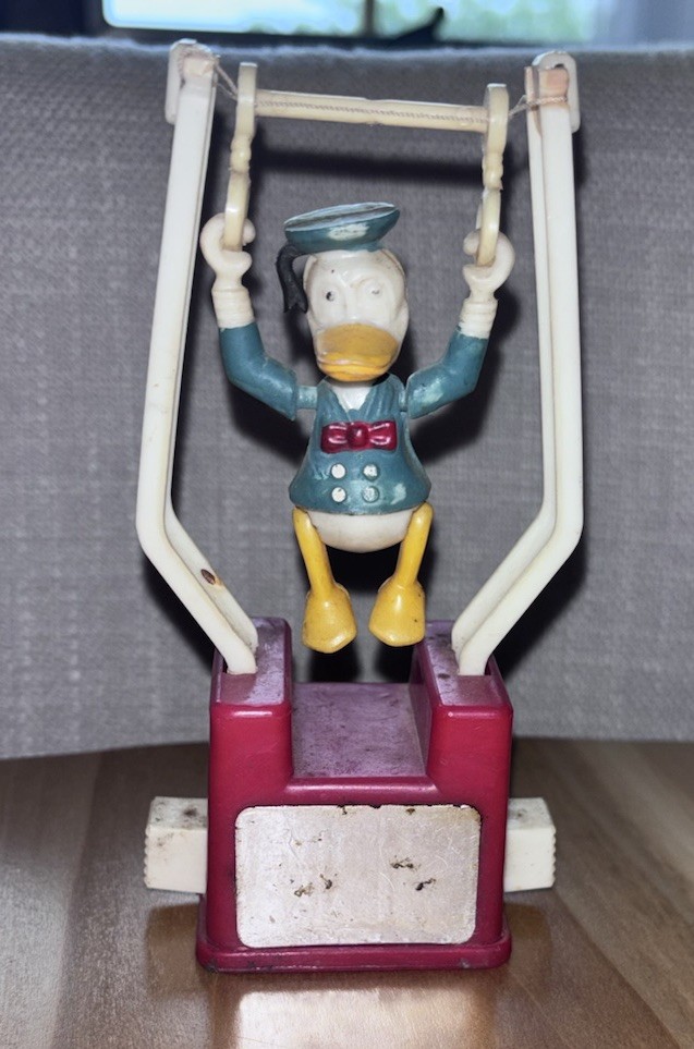 Vtg Plastic Walt Disney DONALD DUCK Trapeze PUSH BUTTON Toy Acrobat WORKS Vtg Plastic Walt Disney DONALD DUCK Trapeze PUSH BUTTON Toy Acrobat WORKS