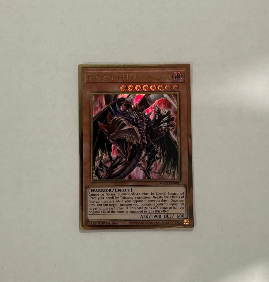 Yugioh: Destiny HERO - Plasma - MGED-EN007 - Gold Rare - 1st Edition - NM Yugioh: Destiny HERO - Plasma - MGED-EN007 - Gold Rare - 1st Edition - NM