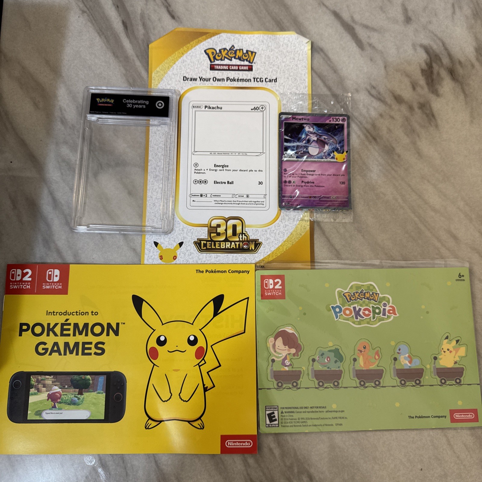 Target mewtwo promo with case, magnets come included Target mewtwo promo with case, magnets come included