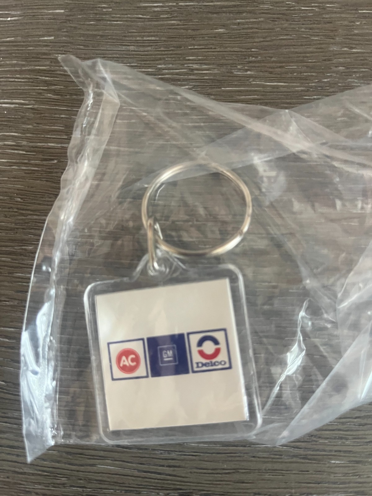 Vintage Unopened AC GM Delco General Motors Lucite Keychain