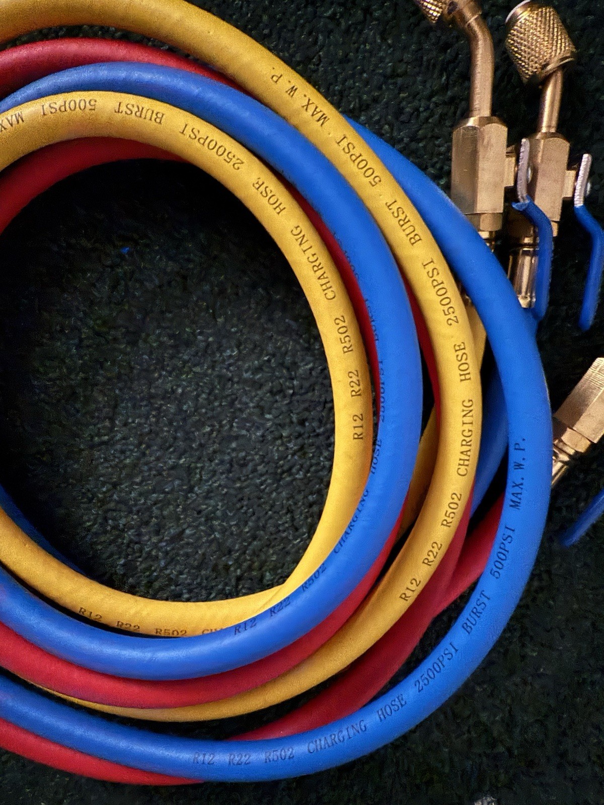 Yellow Jacket R12 R22 R502 charging hose 2500 psi burst 500 psi MAX. W. P. Yellow Jacket R12 R22 R502 charging hose 2500 psi burst 500 psi MAX. W. P.