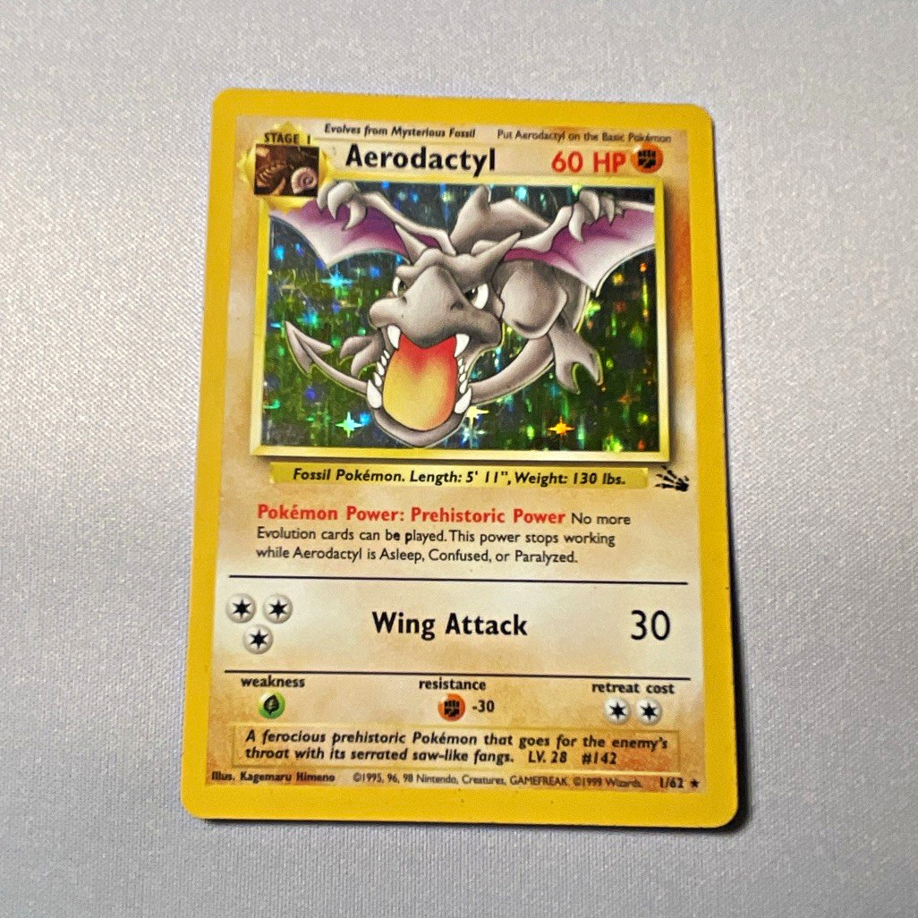 Pokemon Aerodactyl Fossil 1/62 Holo Rare Unlimited English 60 HP 1999 WOTC Pokemon Aerodactyl Fossil 1/62 Holo Rare Unlimited English 60 HP 1999 WOTC