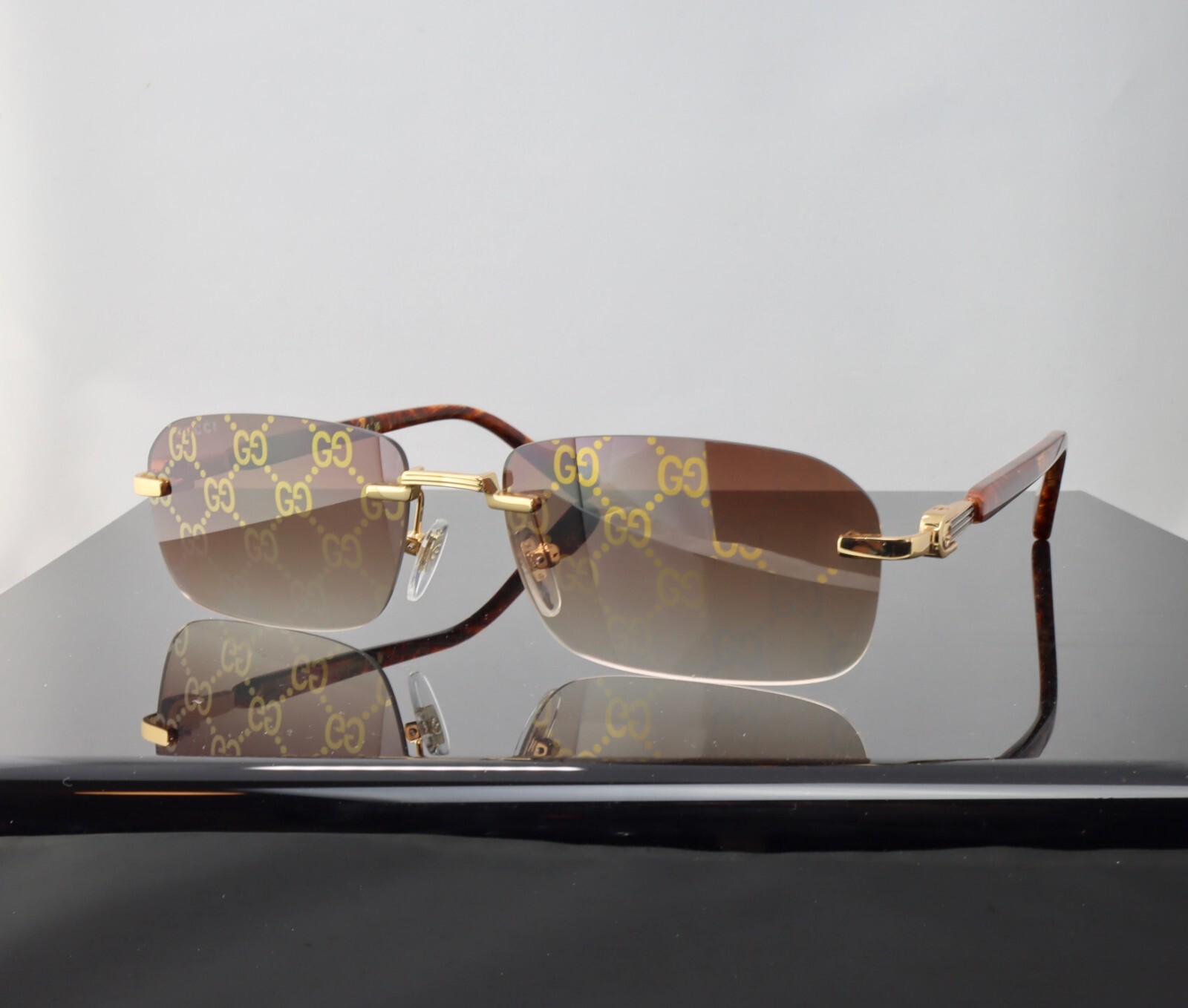 Gucci G1221S 004 Gold / Brown Lens with Pattern Square Rimless Sunglasses 100%UV Gucci G1221S 004 Gold / Brown Lens with Pattern Square Rimless Sunglasses 100%UV