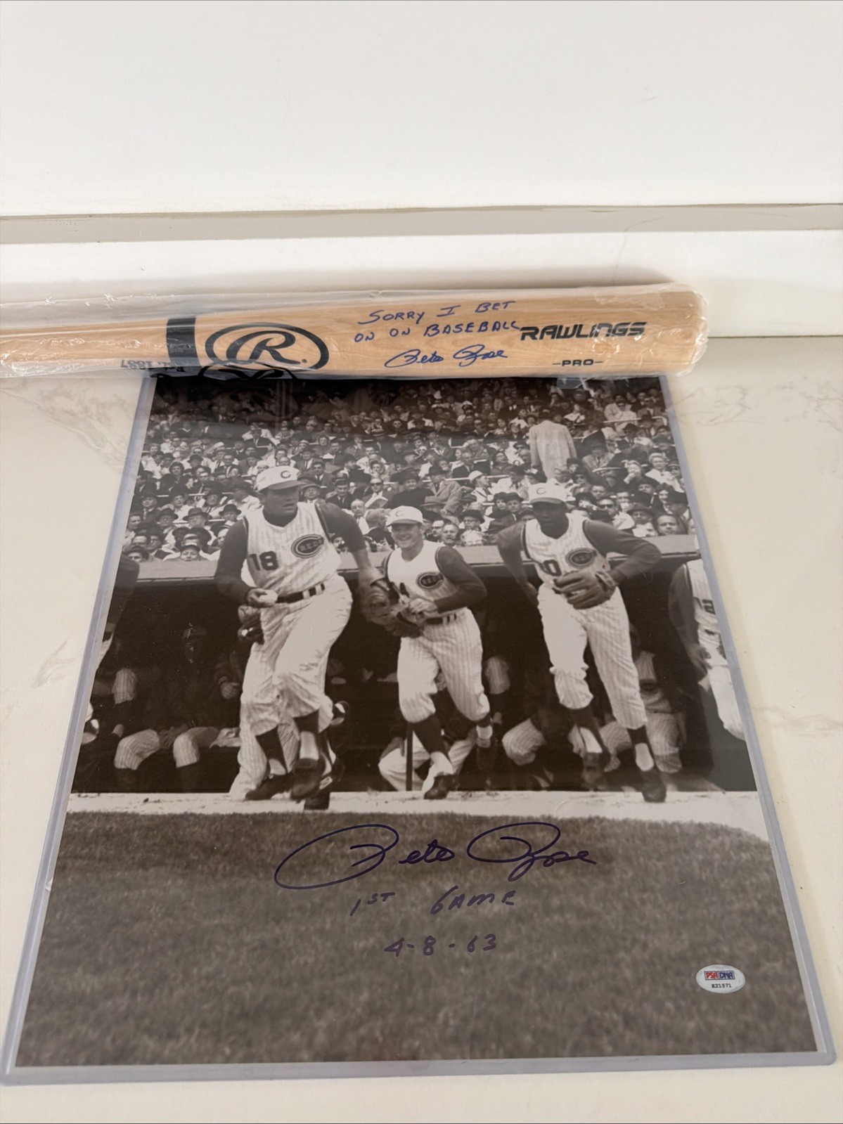 Pete Rose Signed Bat And First Game Photograph. PSA Certified
