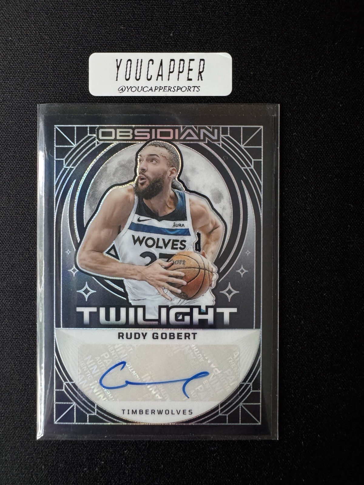 2023-24 Panini Obsidian - Twilight Signatures Rudy Gobert #TS-GOB /99 (AU) 2023-24 Panini Obsidian - Twilight Signatures Rudy Gobert #TS-GOB /99 (AU)
