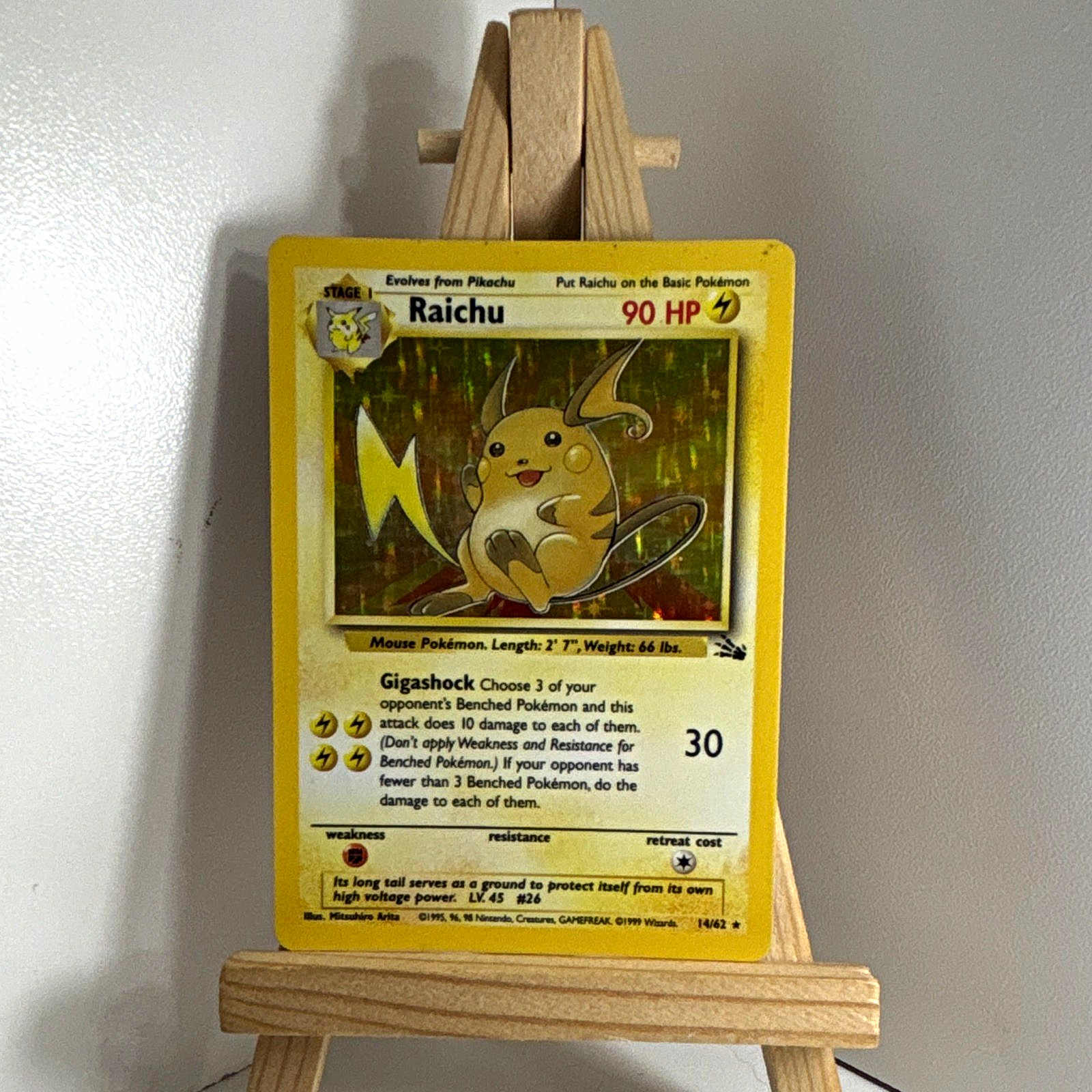 The Pokémon Company Raichu 14/62 Fossil Holo Rare Stage 1 90 HP (1999) The Pokémon Company Raichu 14/62 Fossil Holo Rare Stage 1 90 HP (1999)