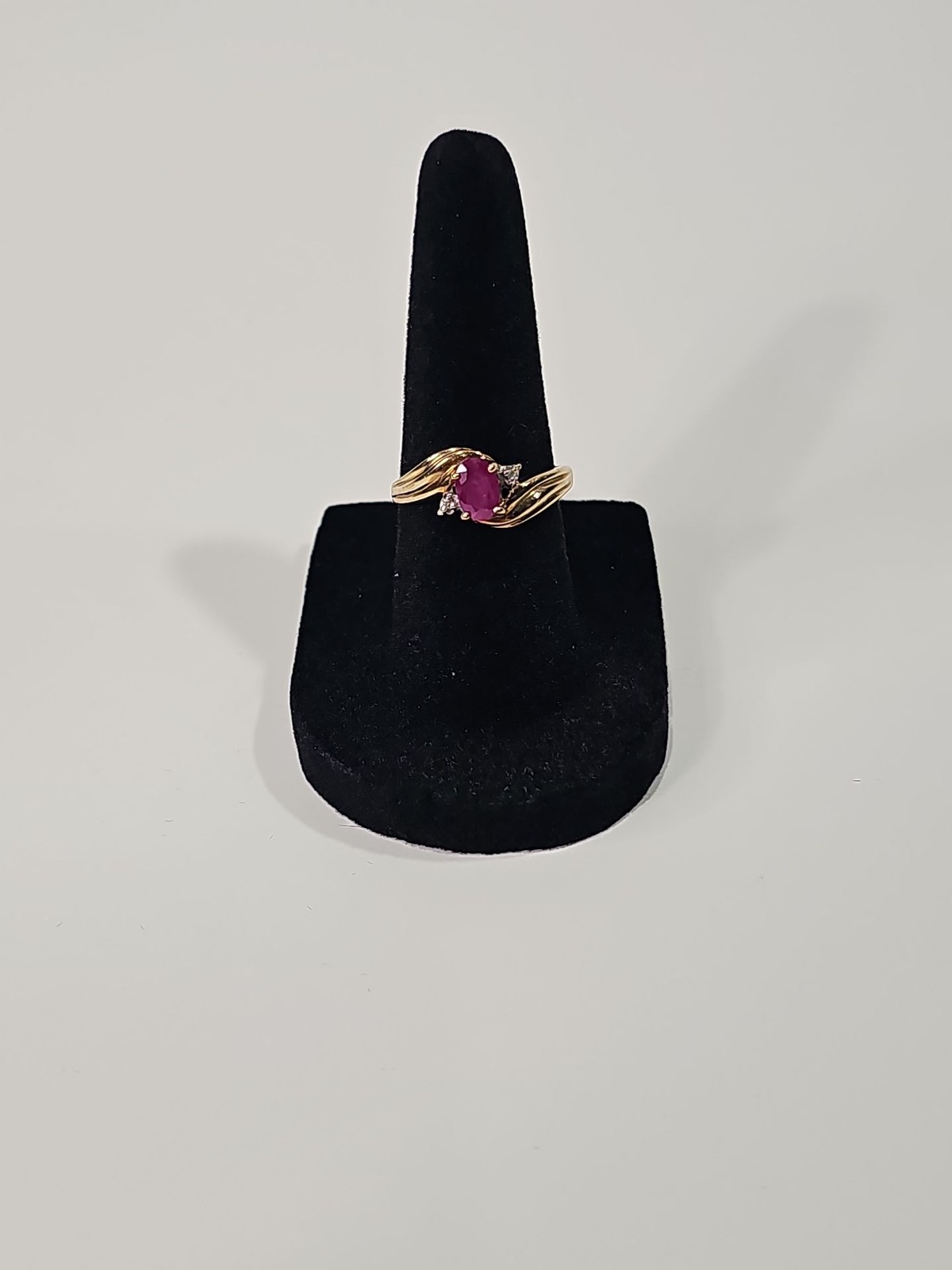 Vintage 10K Yellow Gold Oval Ruby and Diamond Accent Bypass Ring Vintage 10K Yellow Gold Oval Ruby and Diamond Accent Bypass Ring