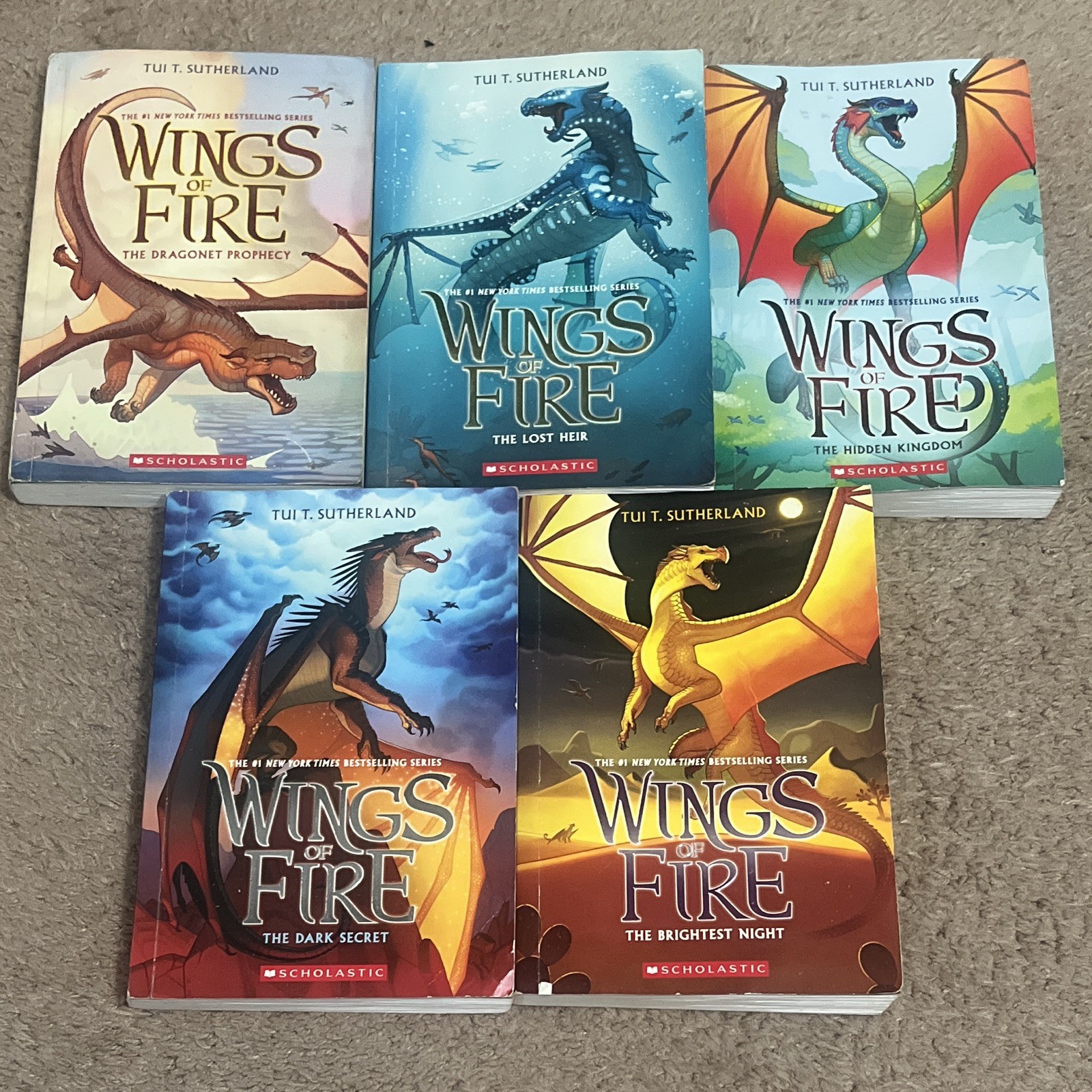 Tui T. Sutherland Wings of Fire, The Complete First Arc— Pre Owned Tui T. Sutherland Wings of Fire, The Complete First Arc— Pre Owned