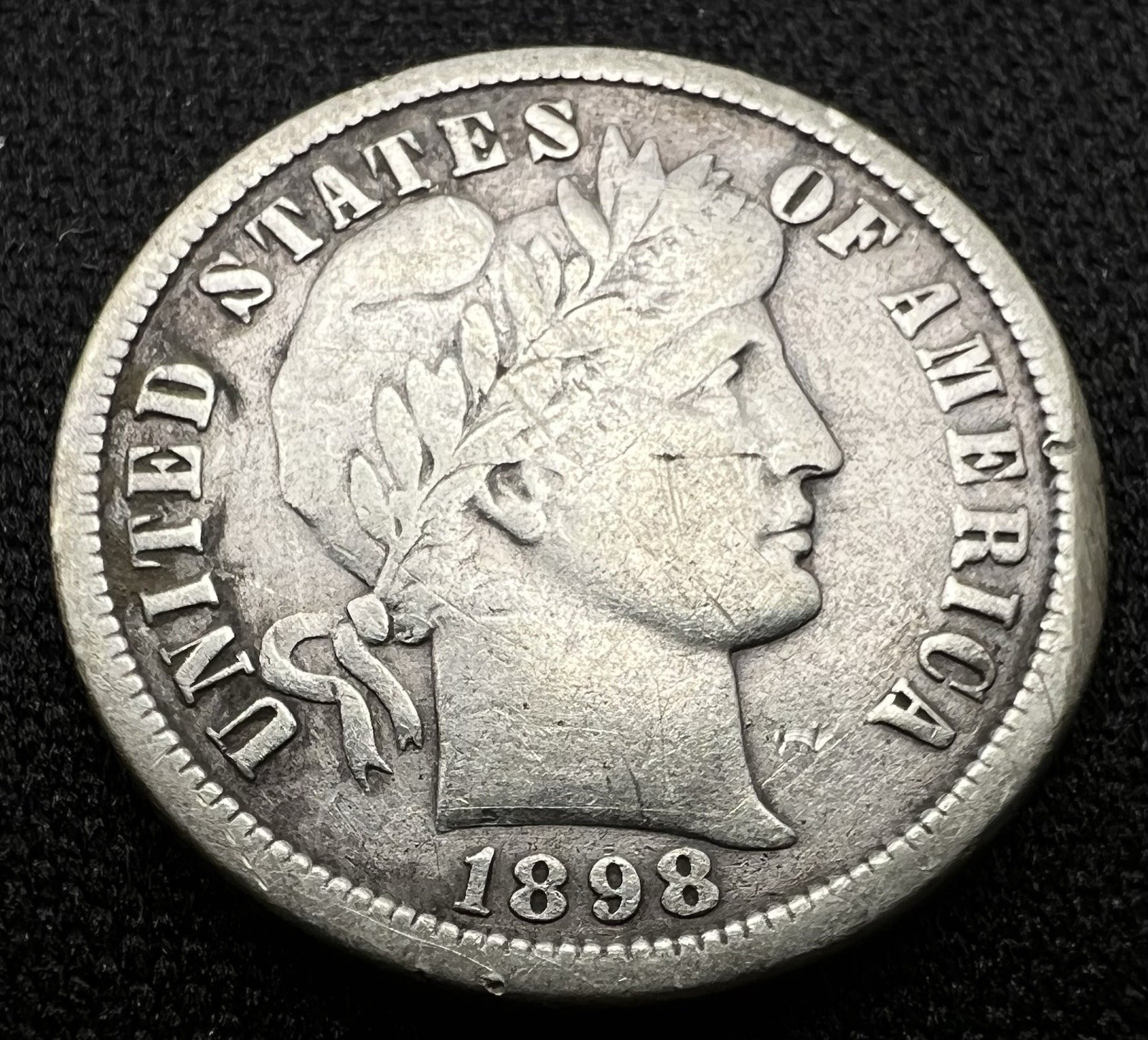 1898-O Barber Dime AU+ with Scratches - Near Full Liberty Silver US 10c