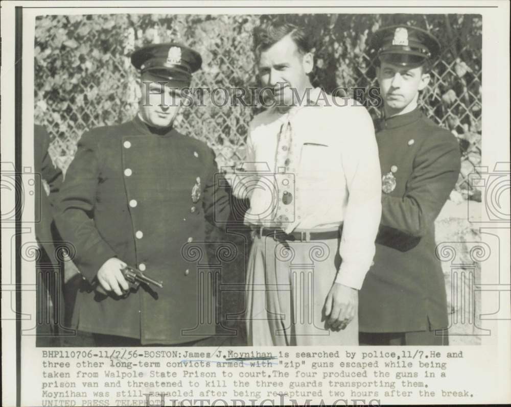 1956 Press Photo James J. Moynihan is searched by police, Boston, Massachusetts