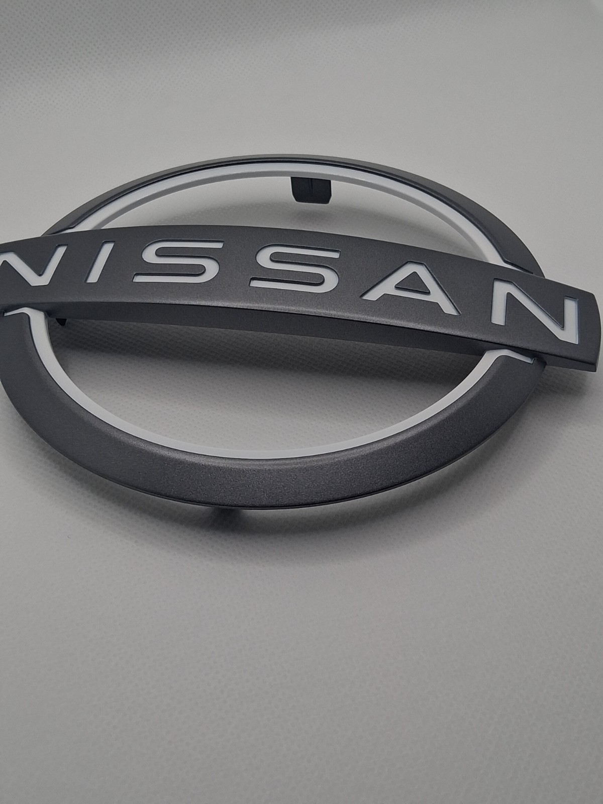 NEW OEM Nissan 2024-2025 Rogue Murano Front Grille Emblem Badge 62890-4MT0A NEW OEM Nissan 2024-2025 Rogue Murano Front Grille Emblem Badge 62890-4MT0A