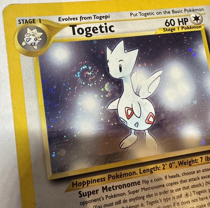 2000 Neo Genesis Togetic #16/111 Unlimited Holo Rare *Double Swirl* 2000 Neo Genesis Togetic #16/111 Unlimited Holo Rare *Double Swirl*