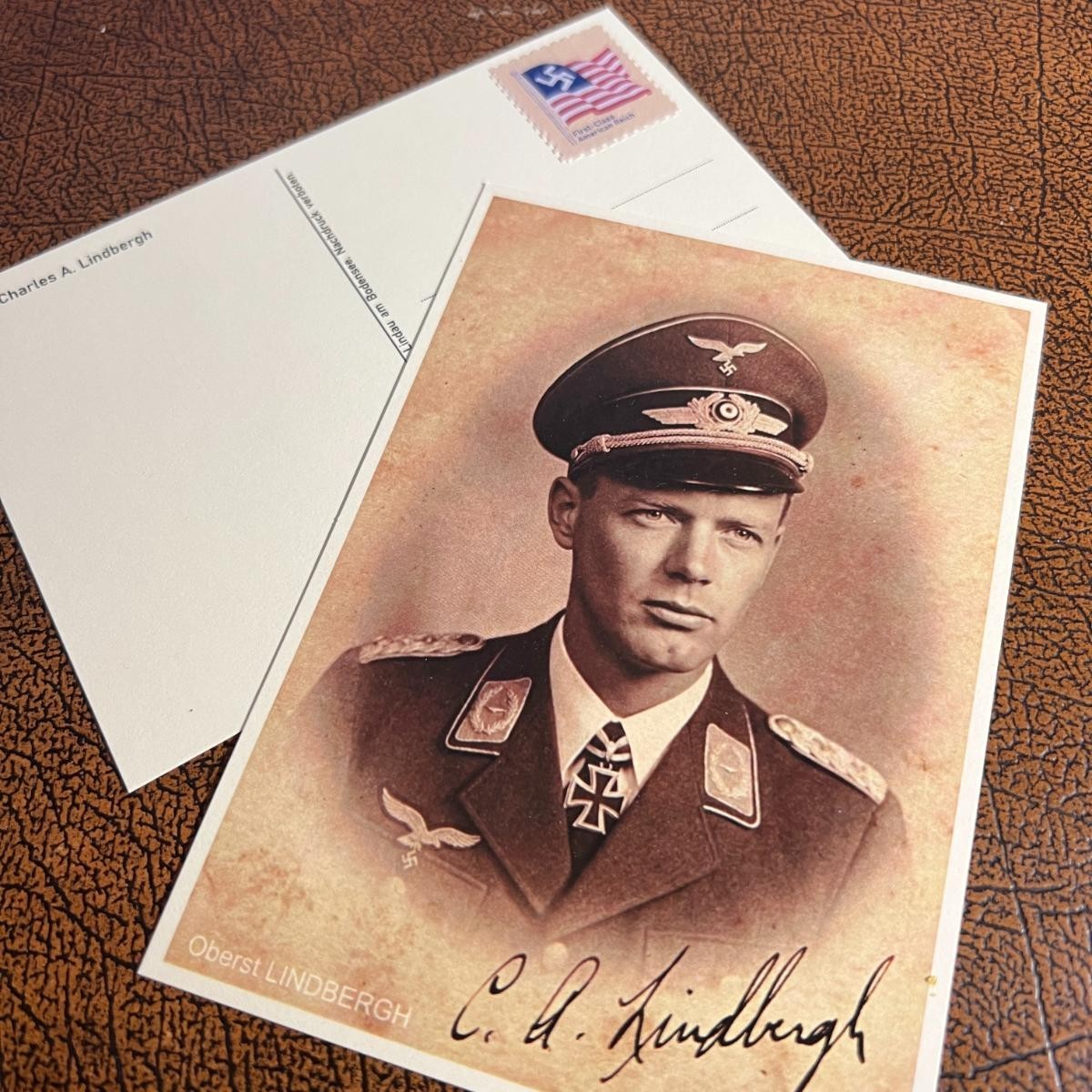 Charles Lindbergh in Luftwaffe Uniform - autographed postcard + unique postage Charles Lindbergh in Luftwaffe Uniform - autographed postcard + unique postage