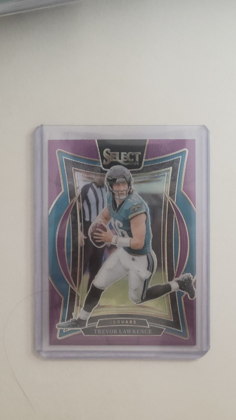 2024 Panini Select - Concourse Trevor Lawrence #98 Purple Prizm /75