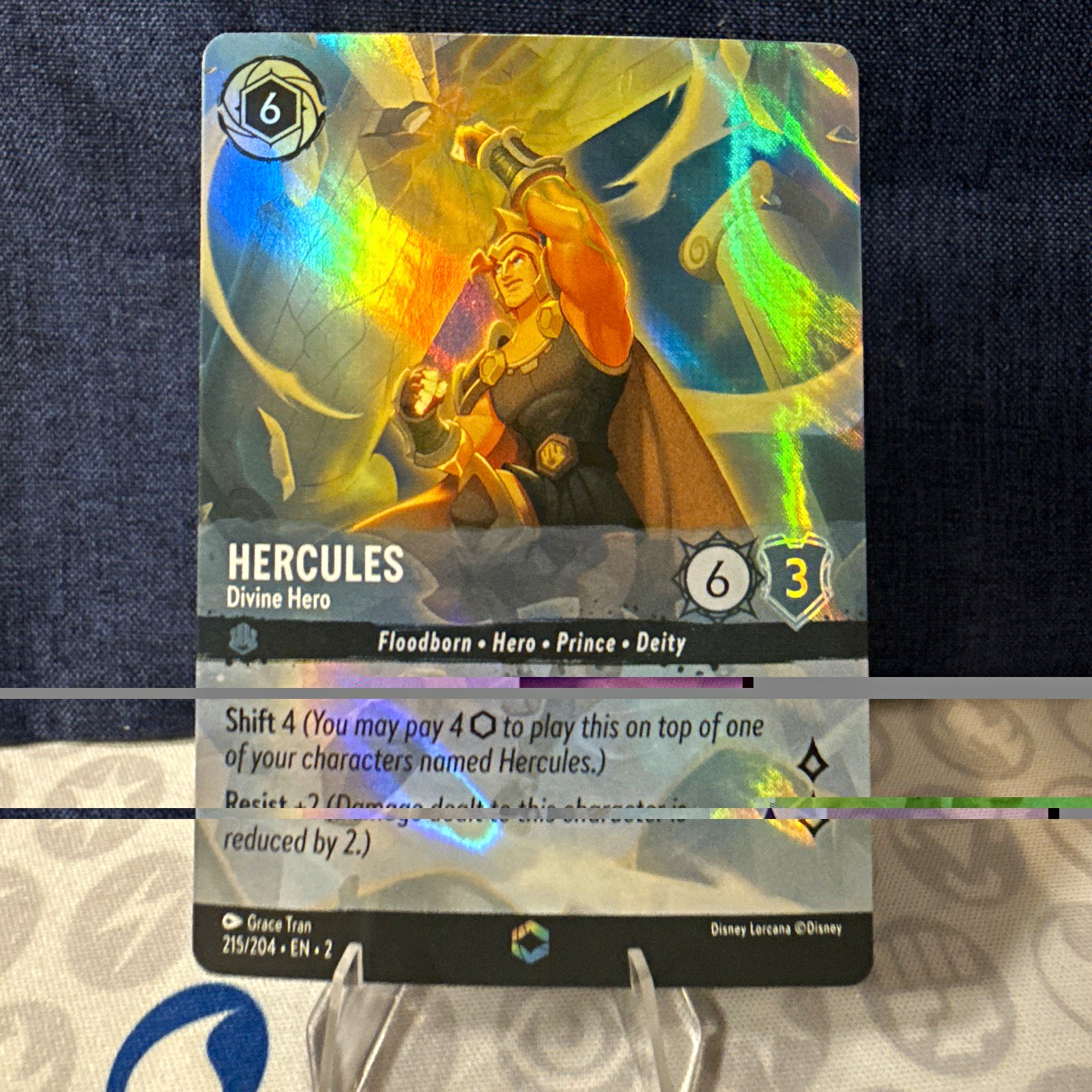 Disney Lorcana Hercules - Divine Hero 215/204 Floodborn Enchanted Holo Eng Disney Lorcana Hercules - Divine Hero 215/204 Floodborn Enchanted Holo Eng