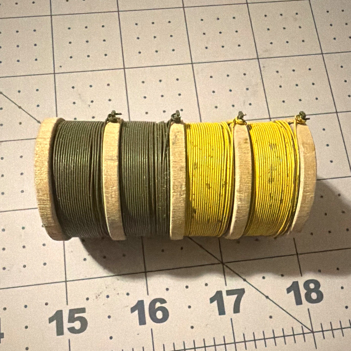 Vintage WWII / Vietnam Era US Military Wood Tripwire Spool - Olive Drab & Yellow Vintage WWII / Vietnam Era US Military Wood Tripwire Spool - Olive Drab & Yellow