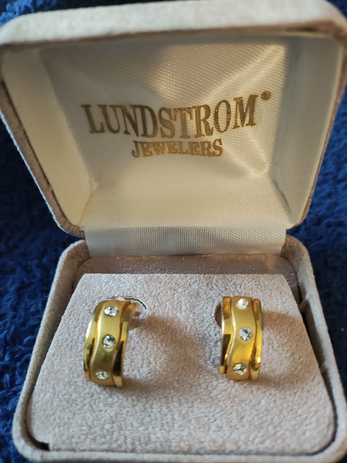 Vintage curved yellow gold Tone hoop earrings with sparkling accent stones Vintage curved yellow gold Tone hoop earrings with sparkling accent stones