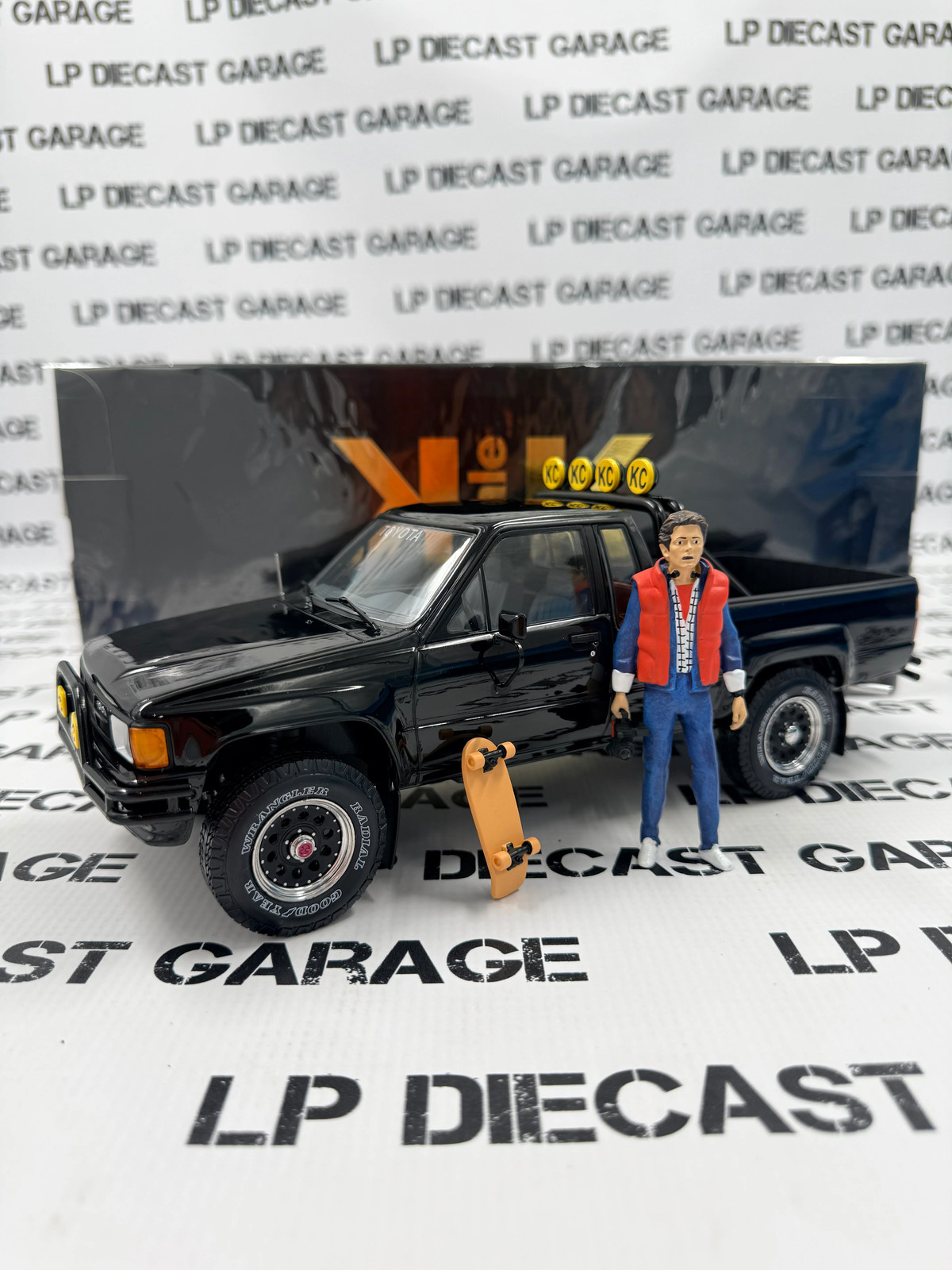 KK Scale 1985 Toyota SR5 Truck Black BTTF w/ Marty Figure 1:18 Diecast KK Scale 1985 Toyota SR5 Truck Black BTTF w/ Marty Figure 1:18 Diecast
