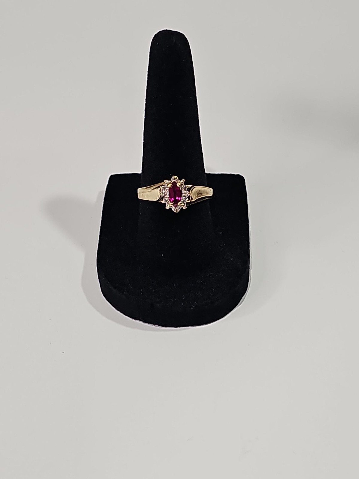 Vintage Marquise Cut Ruby and Diamond Accent 10K Gold Ring Vintage Marquise Cut Ruby and Diamond Accent 10K Gold Ring