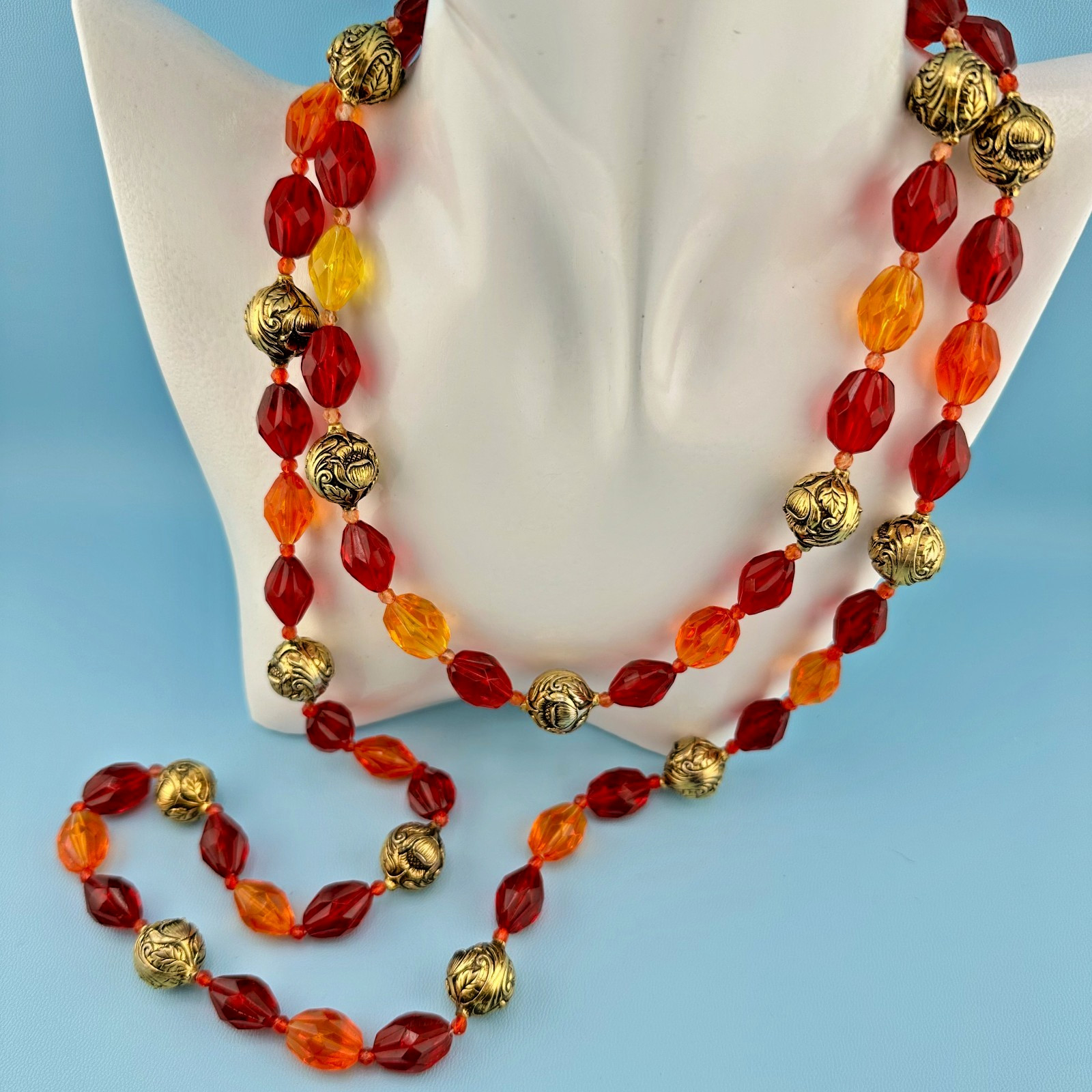 Vintage Lucite Bead Necklace Faceted Oval Red Orange Gold Tone Flower Spacer
