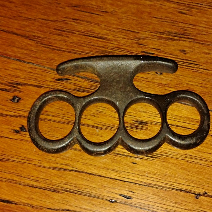Vintage 1930s Cast Iron Knuckle Dusters Vintage 1930s Cast Iron Knuckle Dusters