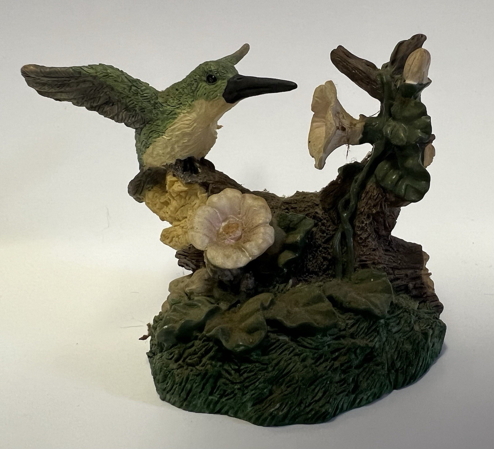 Vintage hand-painted resin ruby-throated hummingbird figurine Vintage hand-painted resin ruby-throated hummingbird figurine