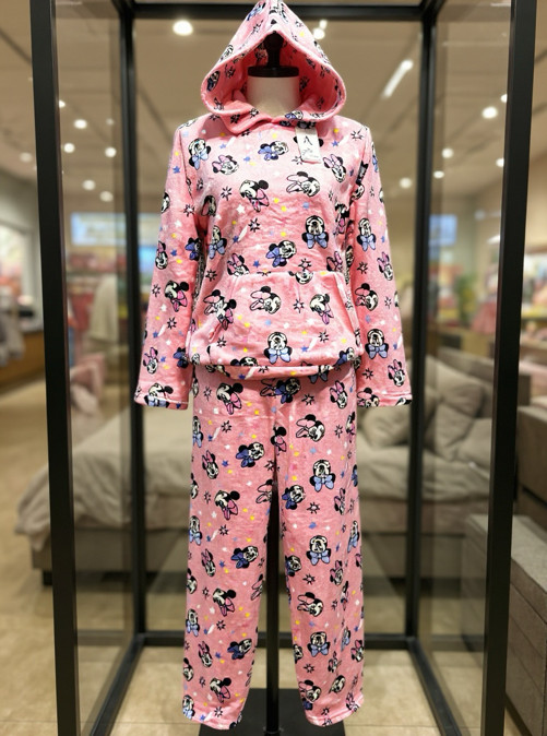 Adorable two-piece pajama set in a soft pink color featuring a charming Minnie M Adorable two-piece pajama set in a soft pink color featuring a charming Minnie M