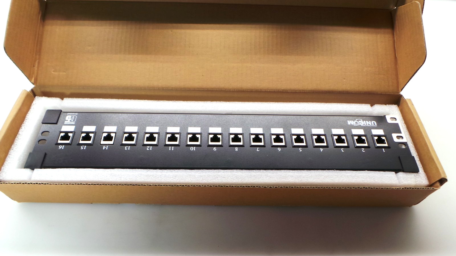 UNICOM ENHANCED C5 16 PORT PATCH PANEL T568B, Enhanced Cat 5 - Open Box UNICOM ENHANCED C5 16 PORT PATCH PANEL T568B, Enhanced Cat 5 - Open Box