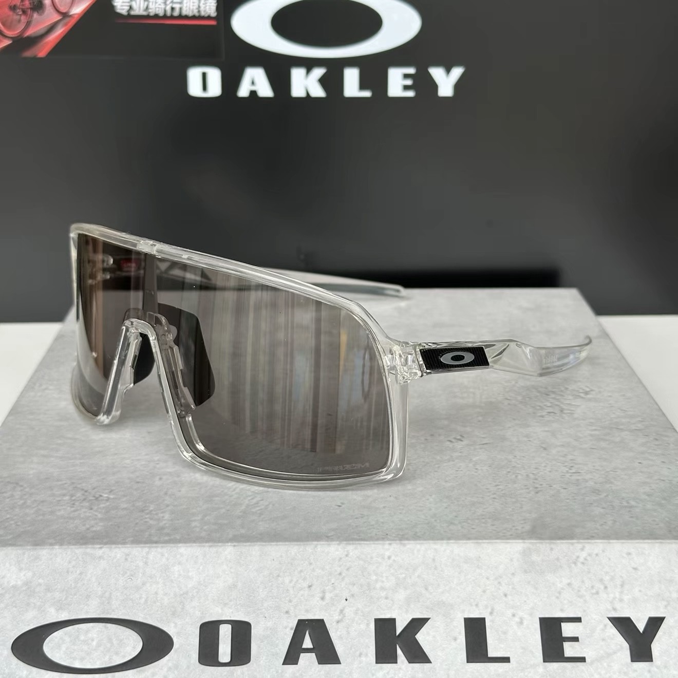 Oakley SUTRO 9406A Cycling Sunglasses, Transparent Frame with Grey Smoke Lenses Oakley SUTRO 9406A Cycling Sunglasses, Transparent Frame with Grey Smoke Lenses