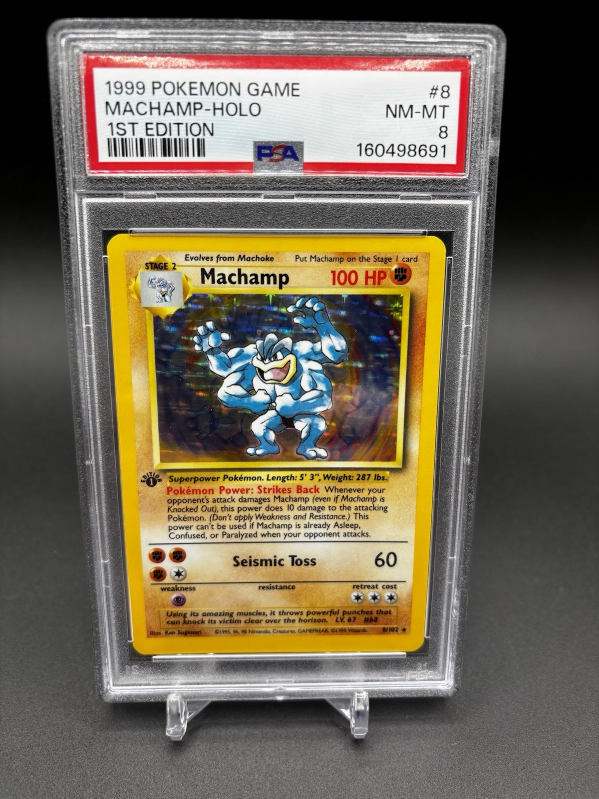 Pokémon TCG 1999 Base Set Machamp Holo 1st Edition 8/102 PSA 8 Pokémon TCG 1999 Base Set Machamp Holo 1st Edition 8/102 PSA 8