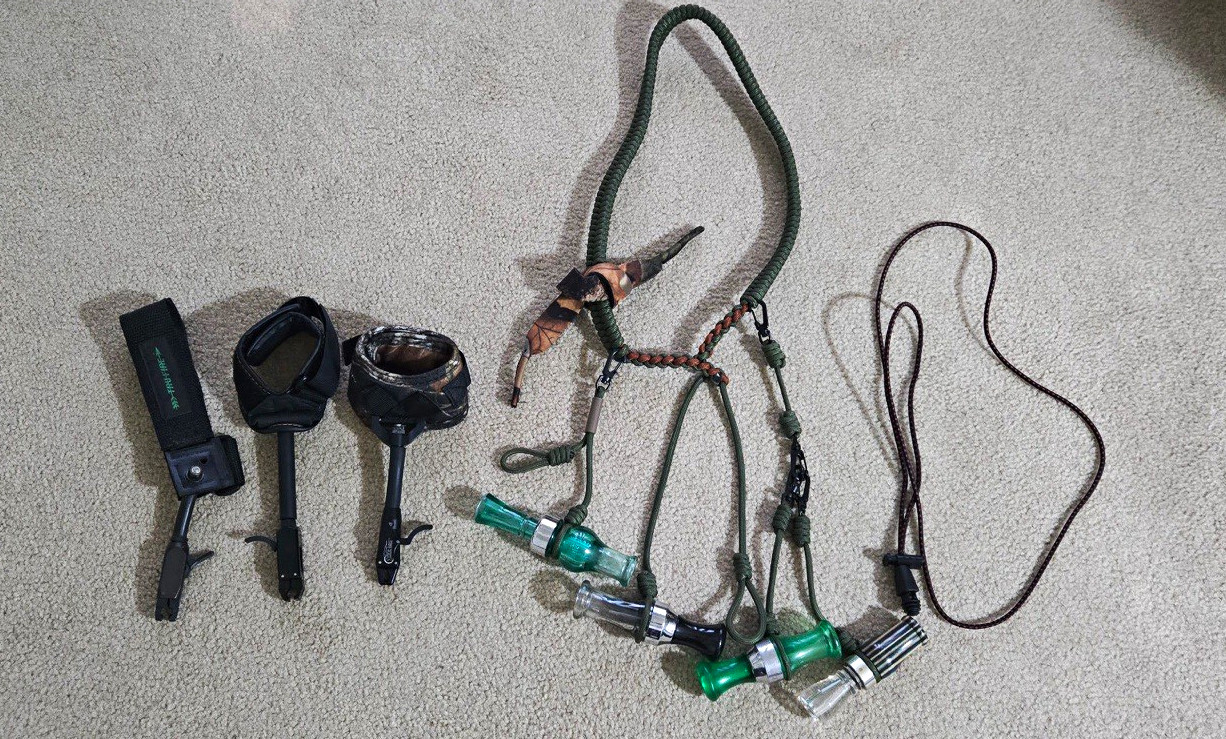 lot of 3 bow releases and 4 duck/goose call w/ 2 lanyards lot of 3 bow releases and 4 duck/goose call w/ 2 lanyards