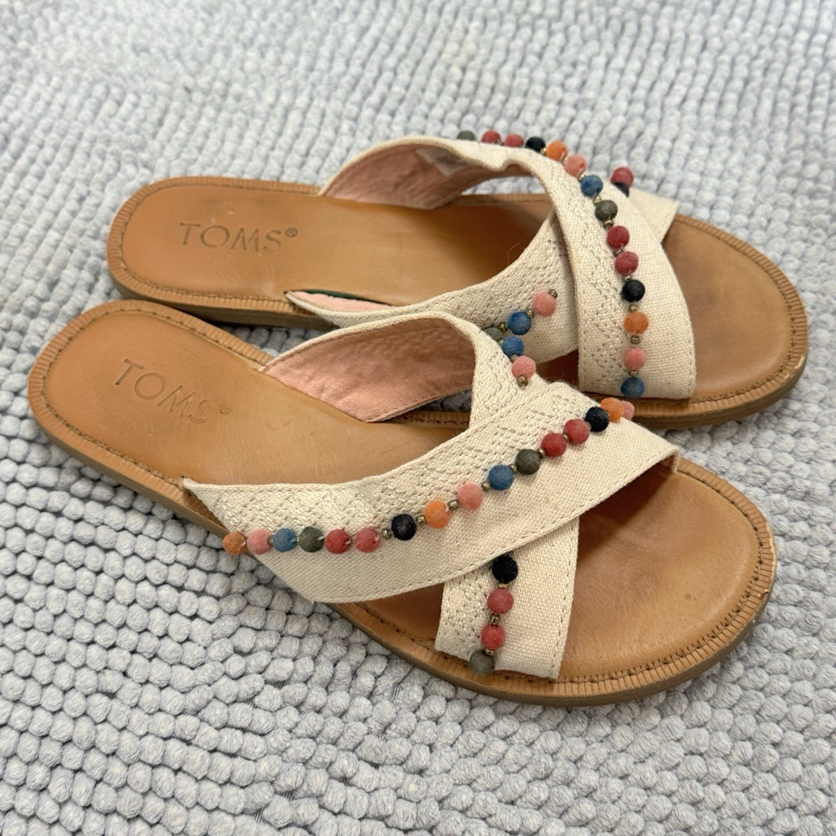 TOMS Women’s Beige Canvas Slide Sandals Crisscross Straps Pom Poms Slip-On 5.5 TOMS Women’s Beige Canvas Slide Sandals Crisscross Straps Pom Poms Slip-On 5.5