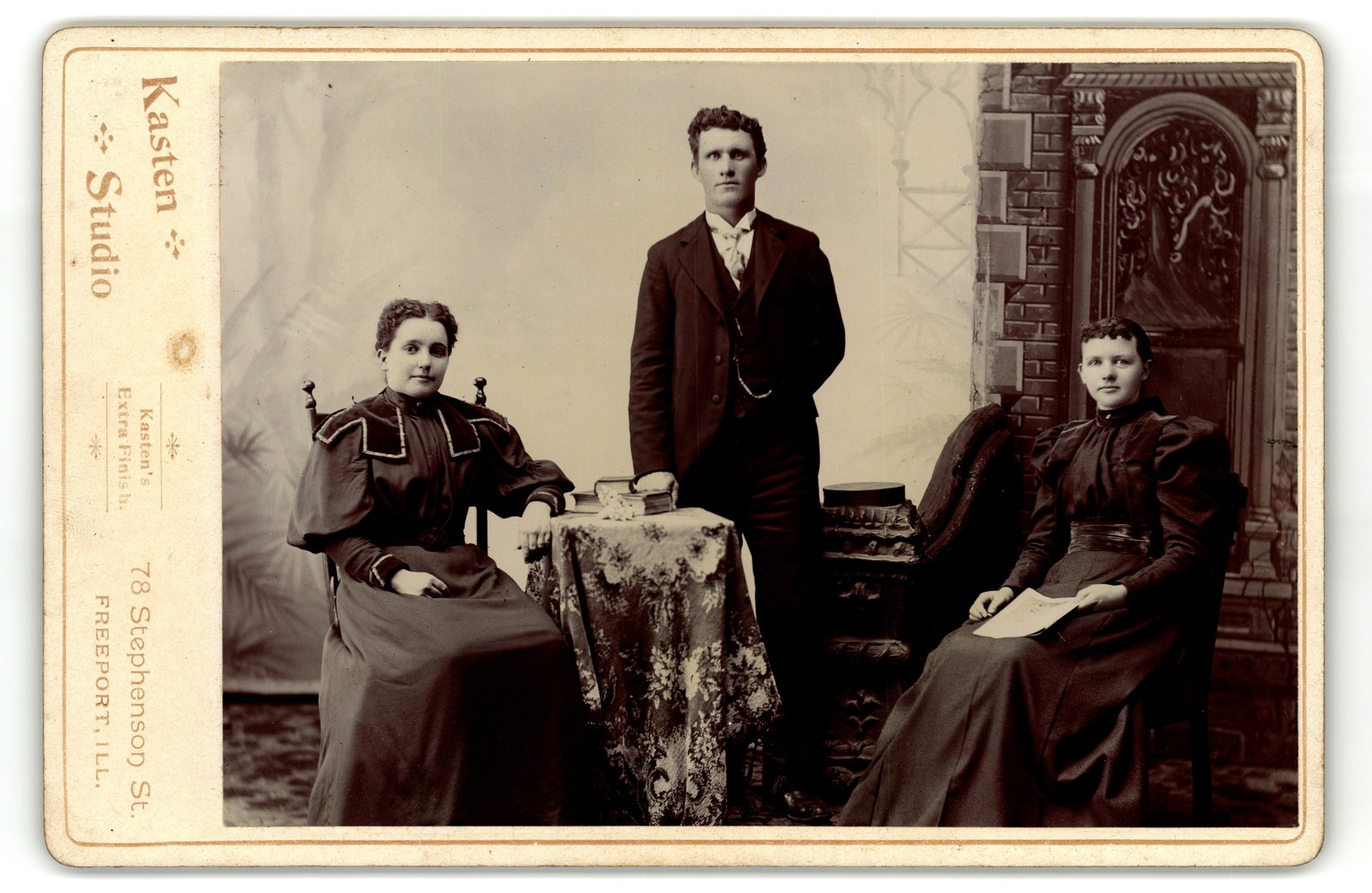 Cabinet Card Circa 1890s Kasten Man & Two Women Dark Dresses Freeport Illinois Cabinet Card Circa 1890s Kasten Man & Two Women Dark Dresses Freeport Illinois