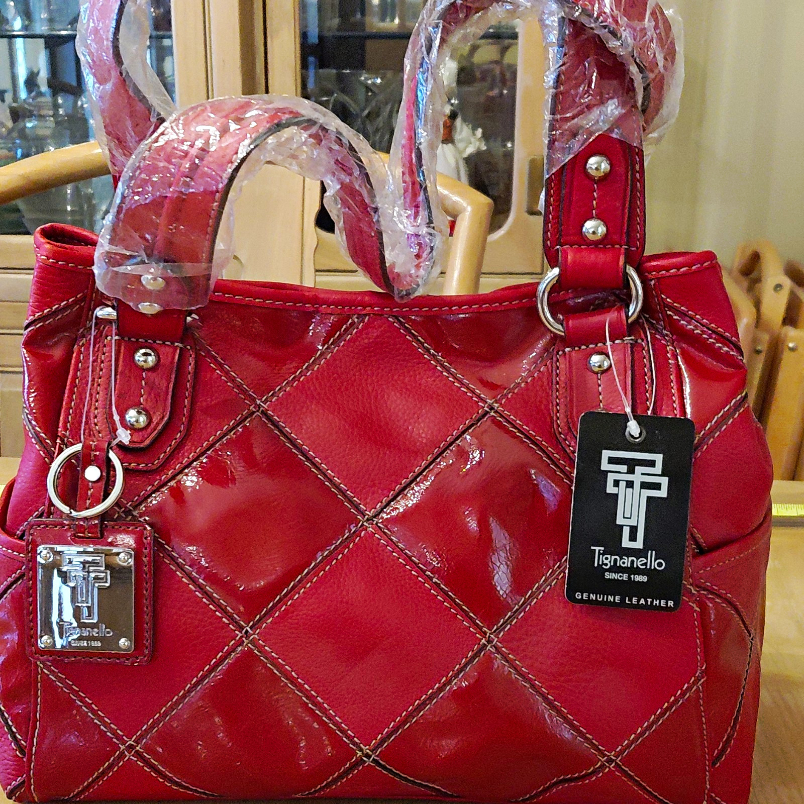 Tignanello Red Quilted Satchel Top Handle Zip, Lined Inner Pockets, Strap Tignanello Red Quilted Satchel Top Handle Zip, Lined Inner Pockets, Strap