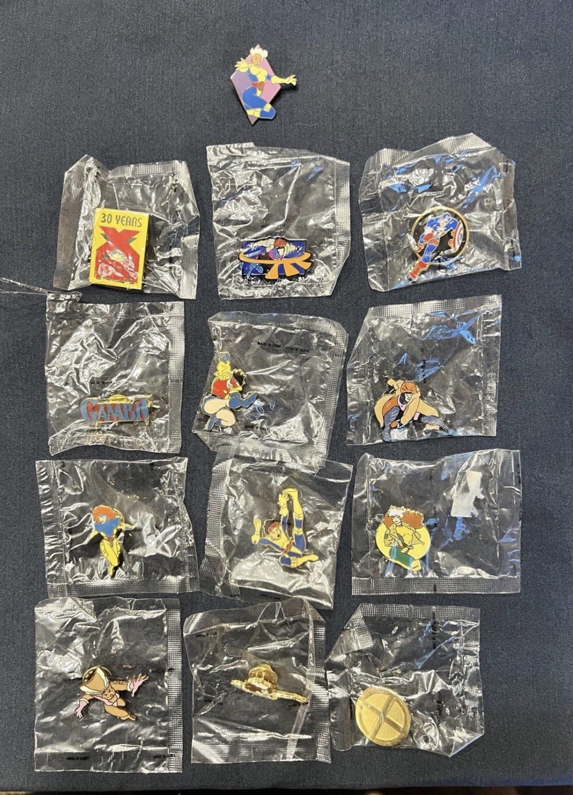 13 RARE VINTAGE COLLECTION MARVEL PLANET STUDIOS PINS, 1991-1994
