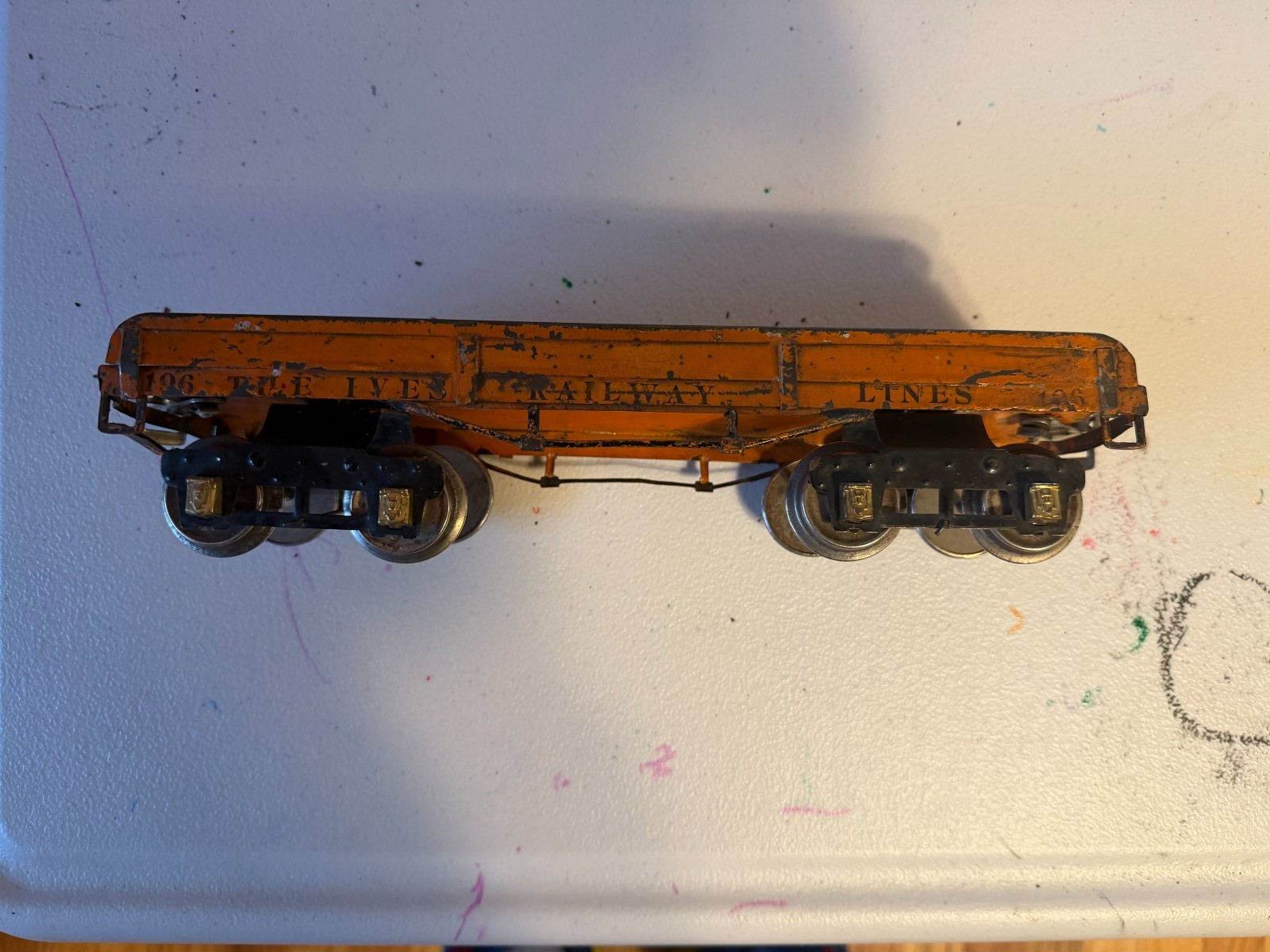 Ives 196 Orange Flat Car Pre War Wide Gauge Ives 196 Orange Flat Car Pre War Wide Gauge