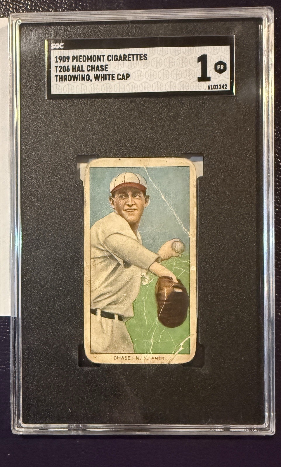 1909-11 T206 - Hal Chase 150 Back Throwing, White Cap (RC)