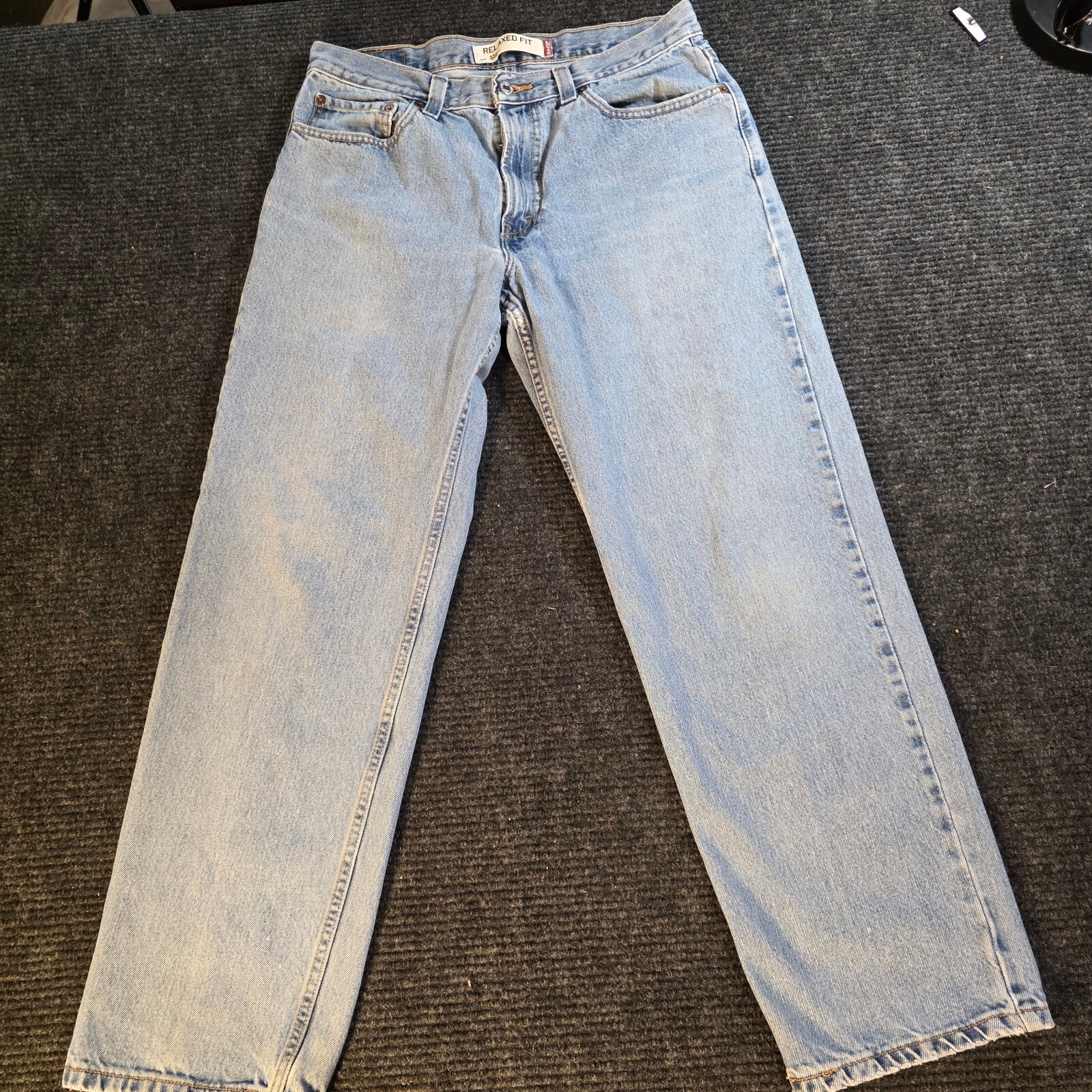 Vintage Levi\'s 550 Relaxed Fit Jeans W33 L30 Light Blue Denim Y2K Vintage Levi\'s 550 Relaxed Fit Jeans W33 L30 Light Blue Denim Y2K