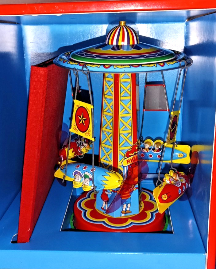 Rocket Ride Wind Up Tin Toy by Schylling Vintage Rocket Carousel Working Order Rocket Ride Wind Up Tin Toy by Schylling Vintage Rocket Carousel Working Order