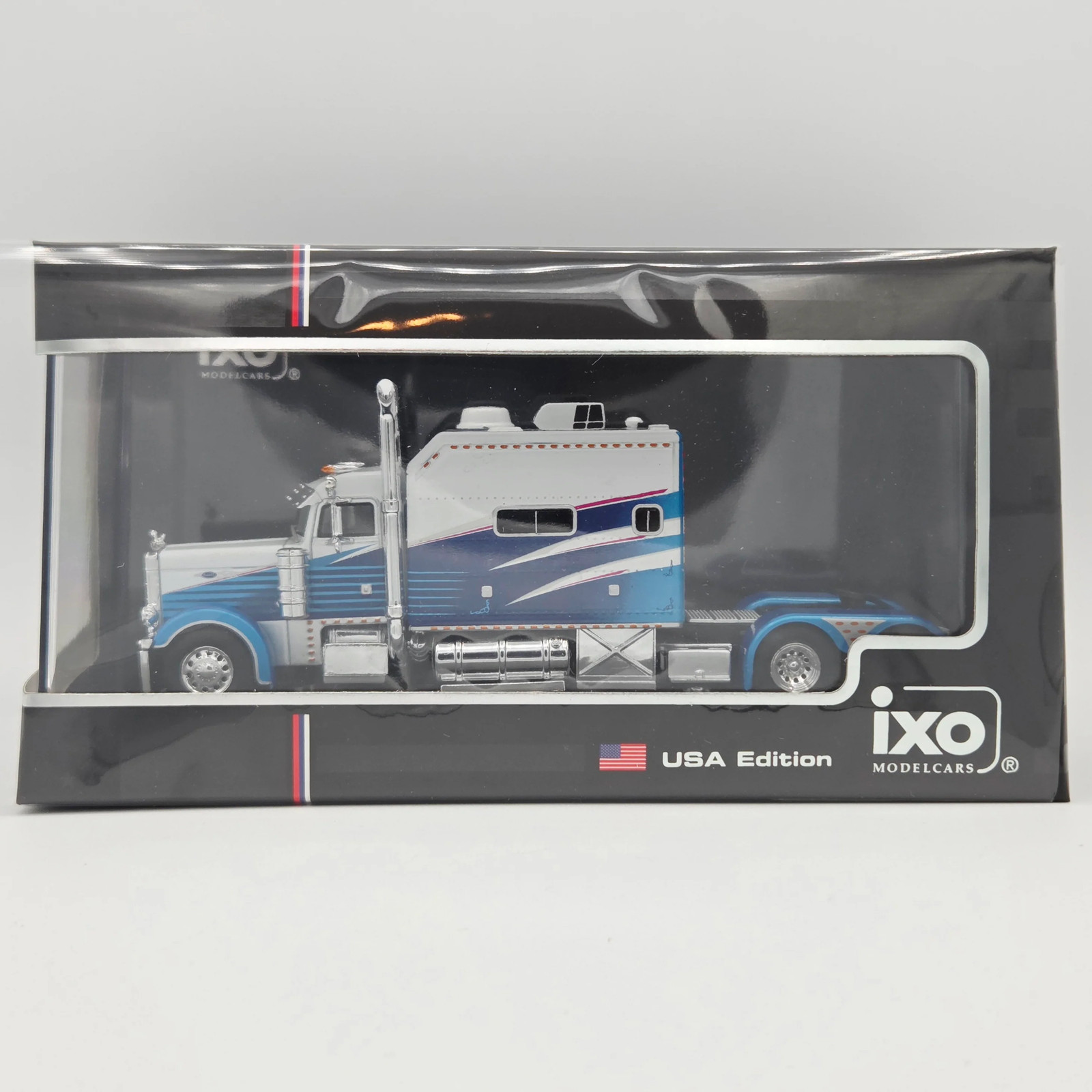iXO Model Cars '02 Peterbilt 379 Semi Truck Cab - 1:64, Blue & White (2026) iXO Model Cars '02 Peterbilt 379 Semi Truck Cab - 1:64, Blue & White (2026)