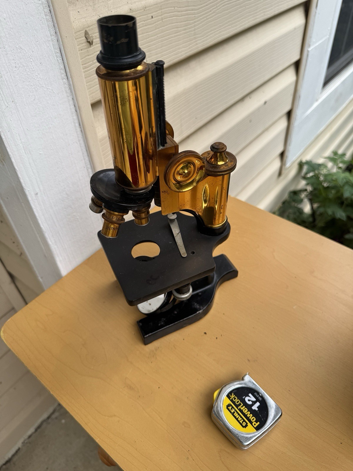 Antique microscope, exquisitely crafted and visually stunning.
