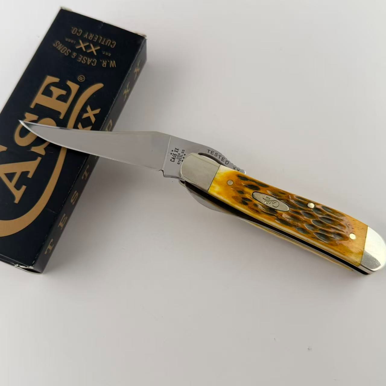 Case xx 00260 Peach Seed Jig Amber Bone RussLock Stainless Folding Pocket Knife