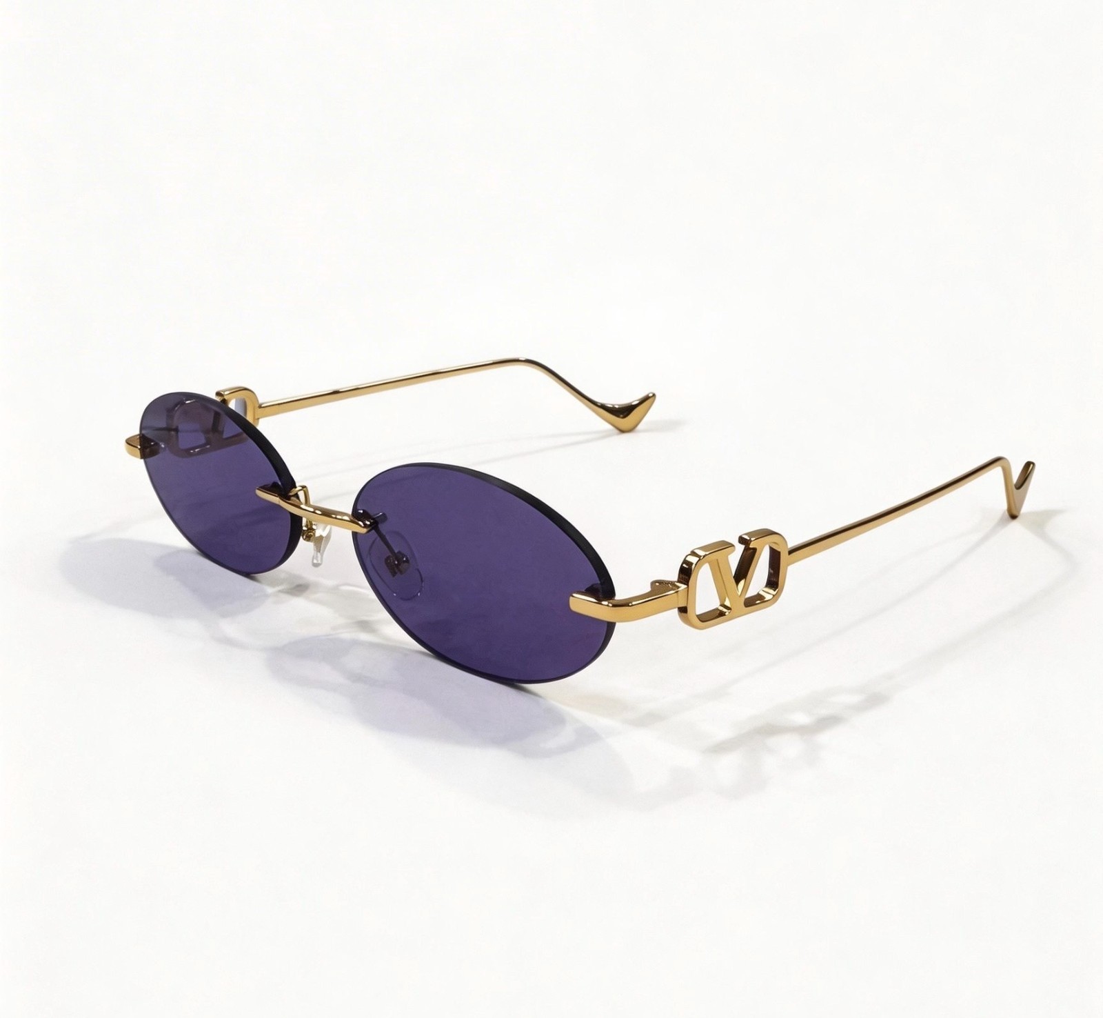 Valentino VLX‑124A Rimless Oval Sunglasses Gold Metal Frame Purple Lens Valentino VLX‑124A Rimless Oval Sunglasses Gold Metal Frame Purple Lens
