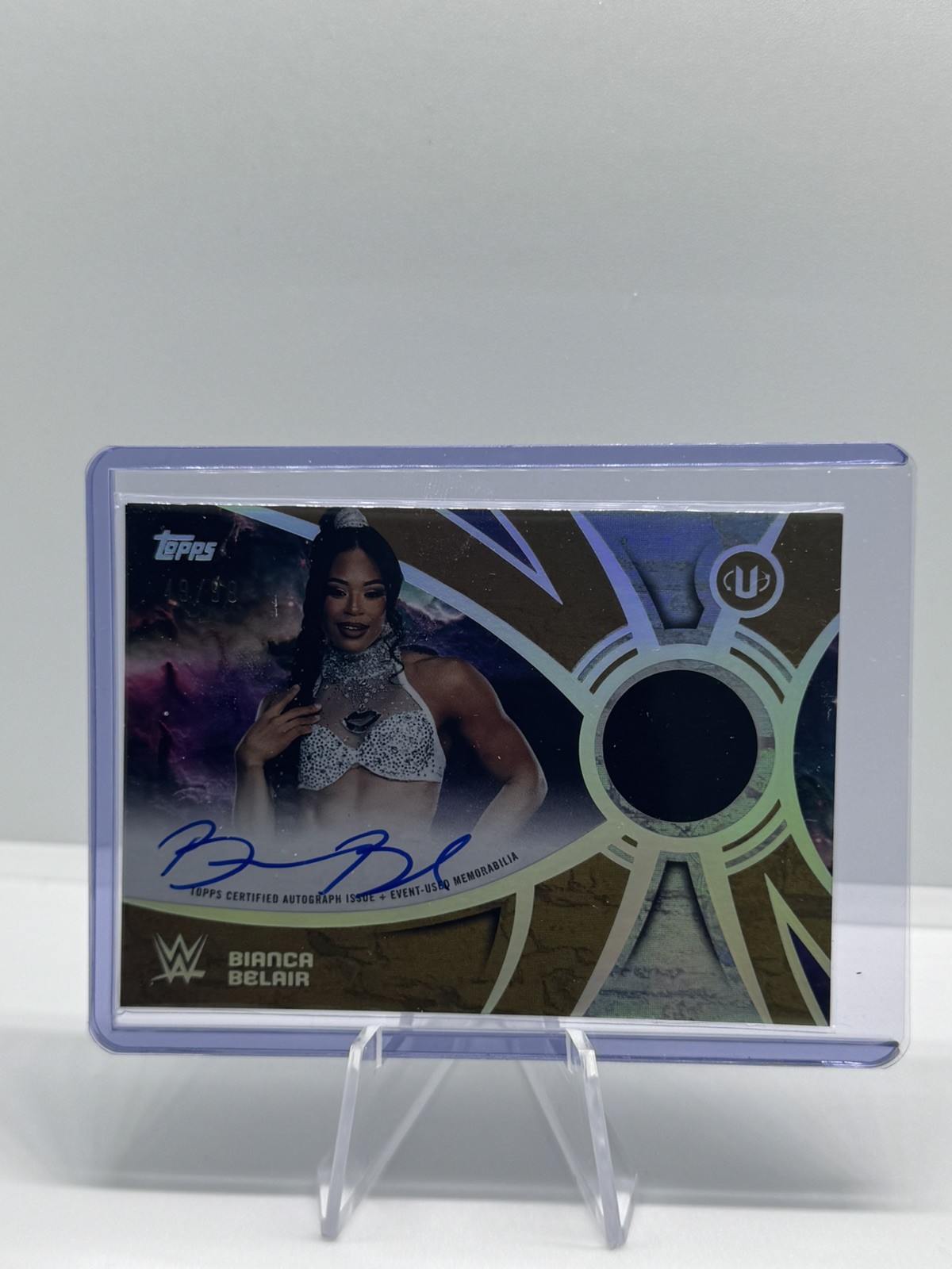 2026 Topps WWE Universe Bianca Belair Auto Relic Gold Stone 49/99 SRS-BB 2026 Topps WWE Universe Bianca Belair Auto Relic Gold Stone 49/99 SRS-BB
